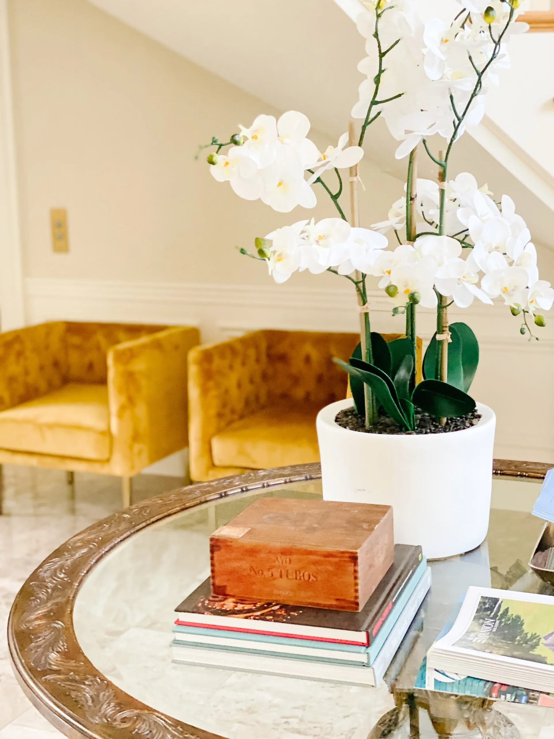 Flowers on a coffee table giving this rustic stage a fresh feel.