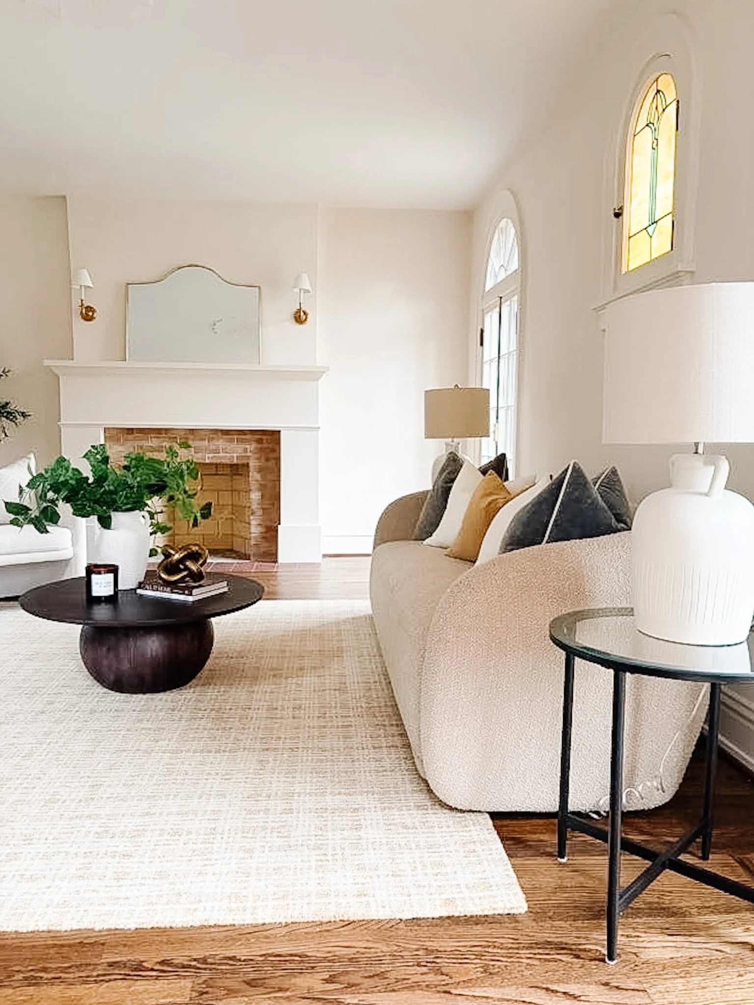 A soft, neutral living room designed to feel warm, inviting, and easy for buyers to imagine as their own.